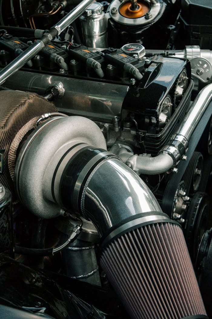 my-path High-resolution image showcasing intricate details of a car engine and its components.